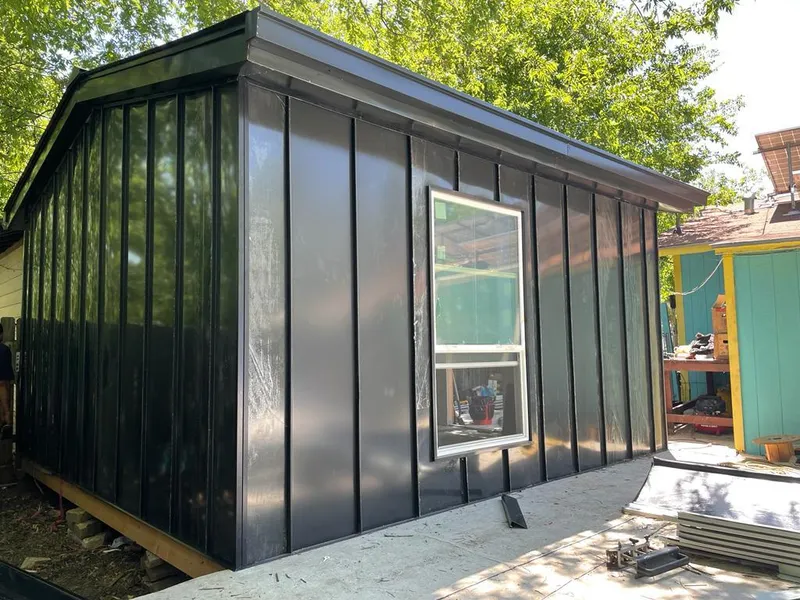 Black standing seam metal wall panels for Metal Roof Installation in White Center