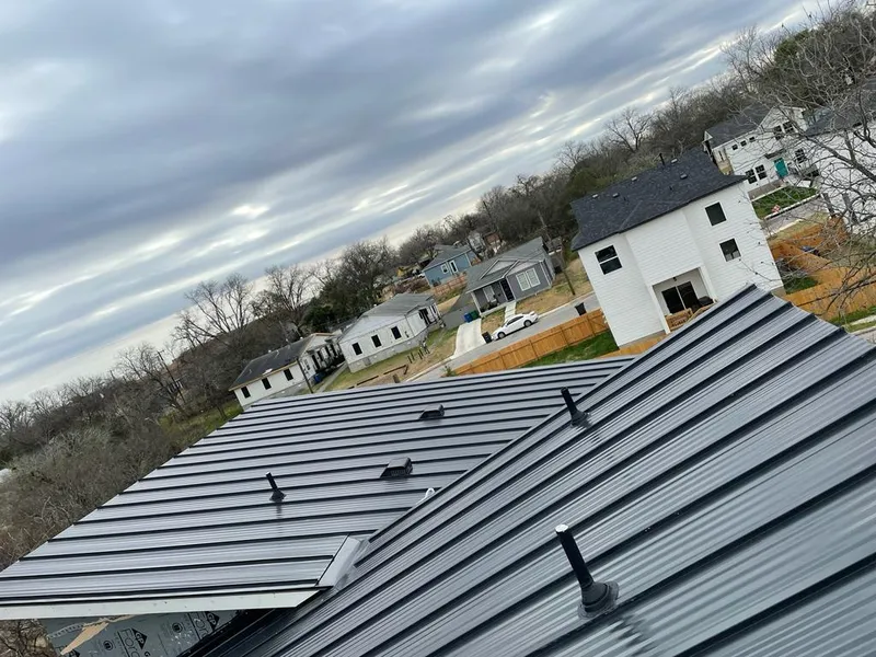 Standing seam metal roof panels with vents for Skylight Repair in White Center